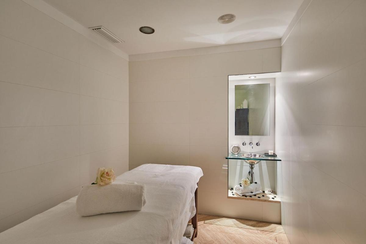 Cama o camas de una habitación en Cas Comte Suites & Spa - Adults Only