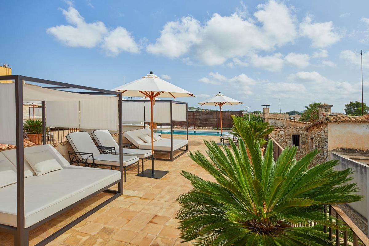 Un balcón o terraza de Cas Comte Suites & Spa - Adults Only