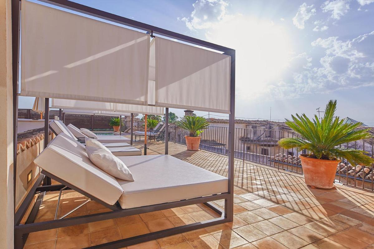 Un balcón o terraza de Cas Comte Suites & Spa - Adults Only
