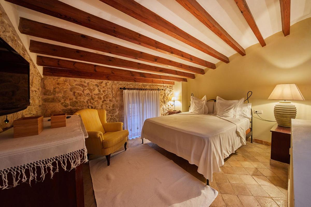 Cama o camas de una habitación en Cas Comte Suites & Spa - Adults Only
