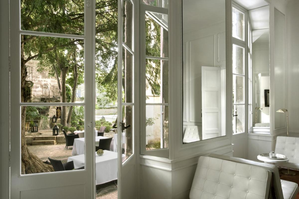 Restaurant ou autre lieu de restauration dans l'établissement L'Hôtel Particulier