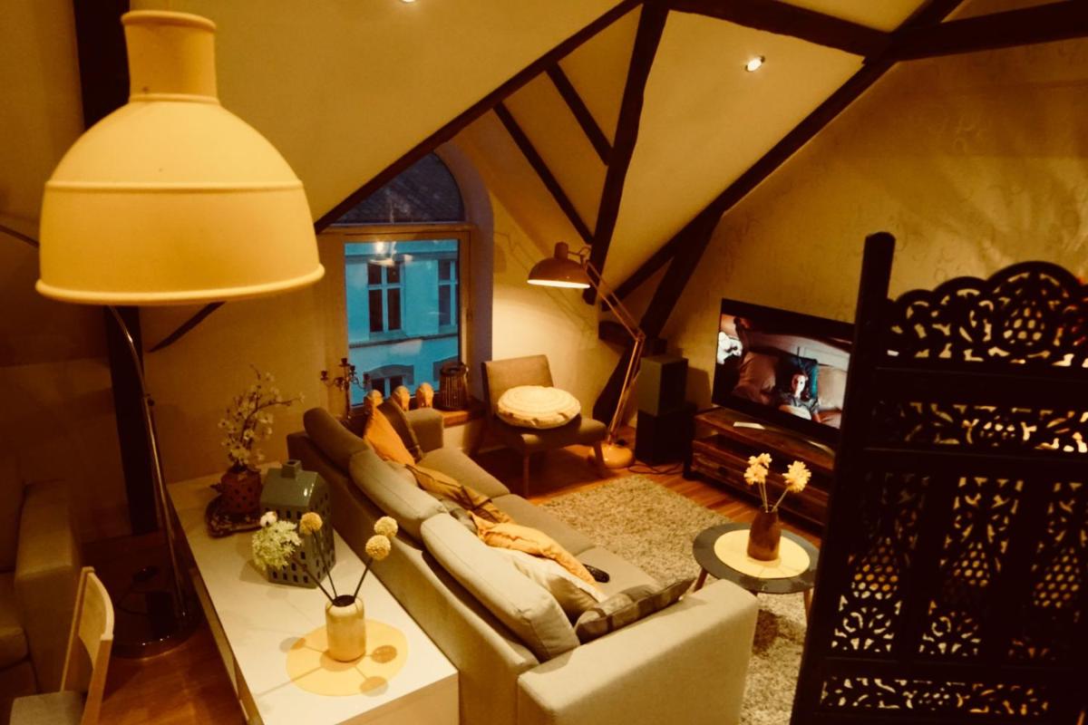 Ålesund downtown loft room with shared bathroom - Housity