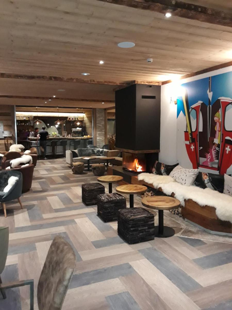 Coin salon dans l'établissement Chalet Marano Restaurant & Spa
