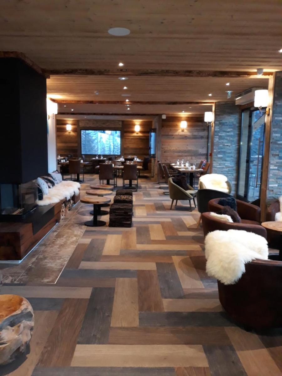 Coin salon dans l'établissement Chalet Marano Restaurant & Spa
