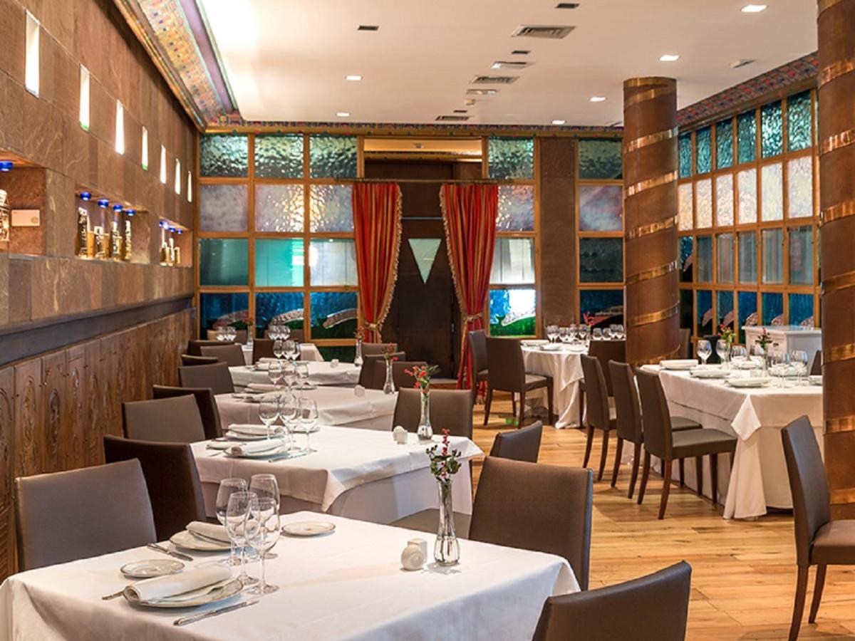 Un restaurante o sitio para comer en Eurostars Hotel de la Reconquista