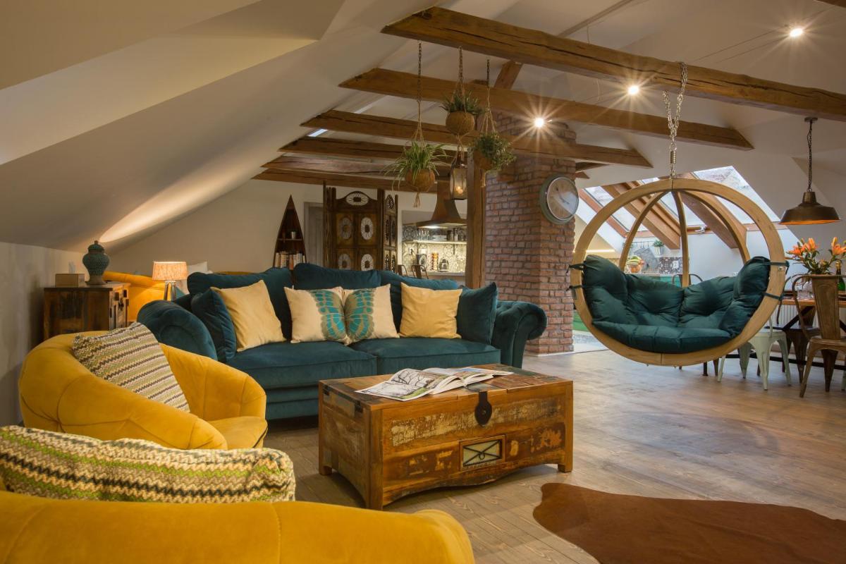 Gigantic Boho Chic 3 Bedroom 3 Bathroom Loft with Hanging Chair - Housity