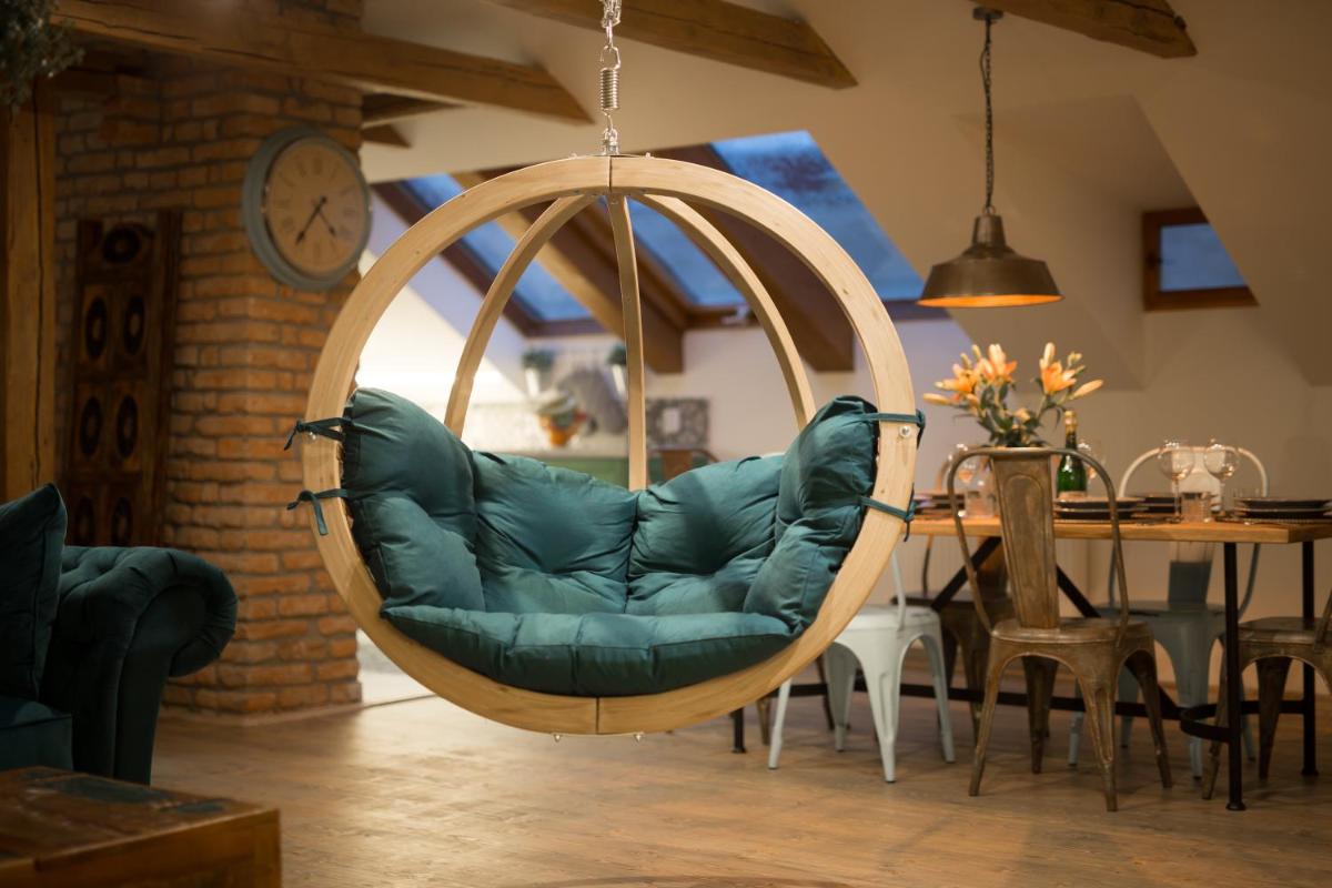Gigantic Boho Chic 3 Bedroom 3 Bathroom Loft with Hanging Chair - Housity