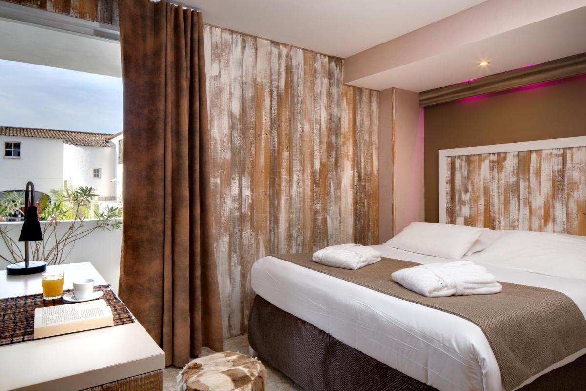 Un ou plusieurs lits dans un hébergement de l'établissement Vila De La Mar & Spa