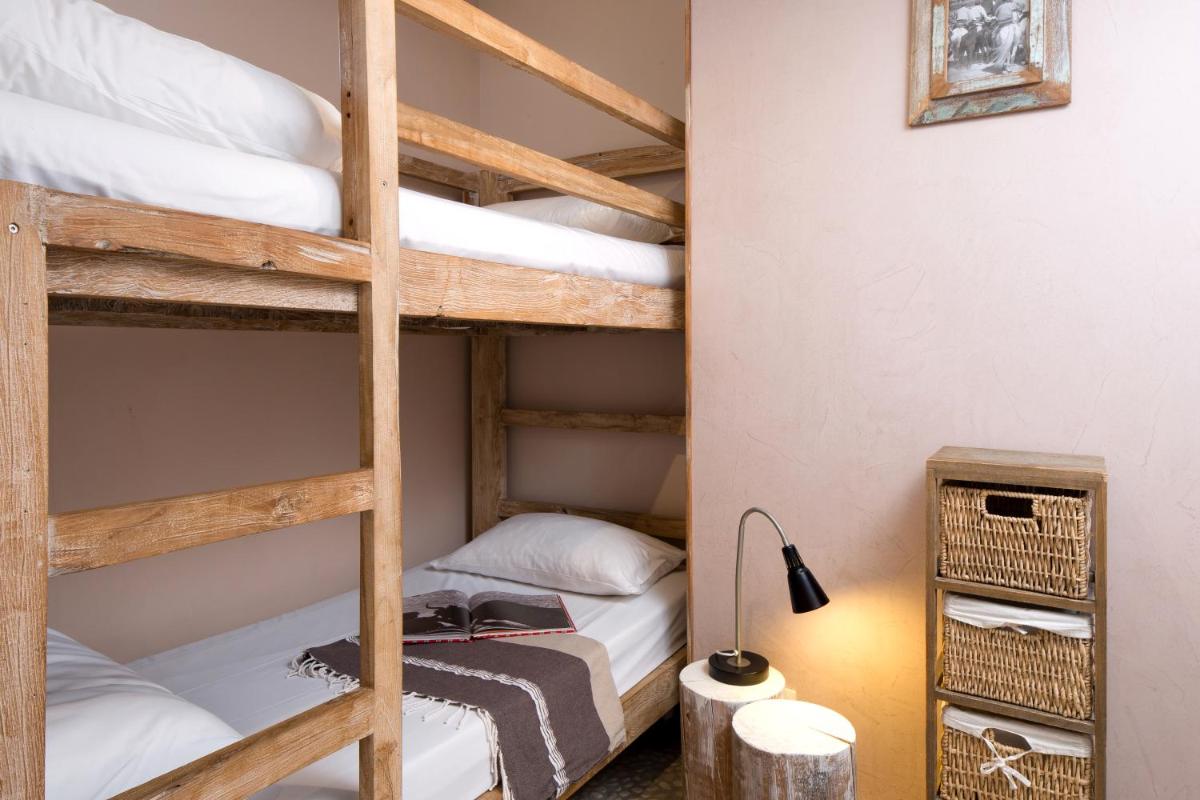Un ou plusieurs lits dans un hébergement de l'établissement Vila De La Mar & Spa