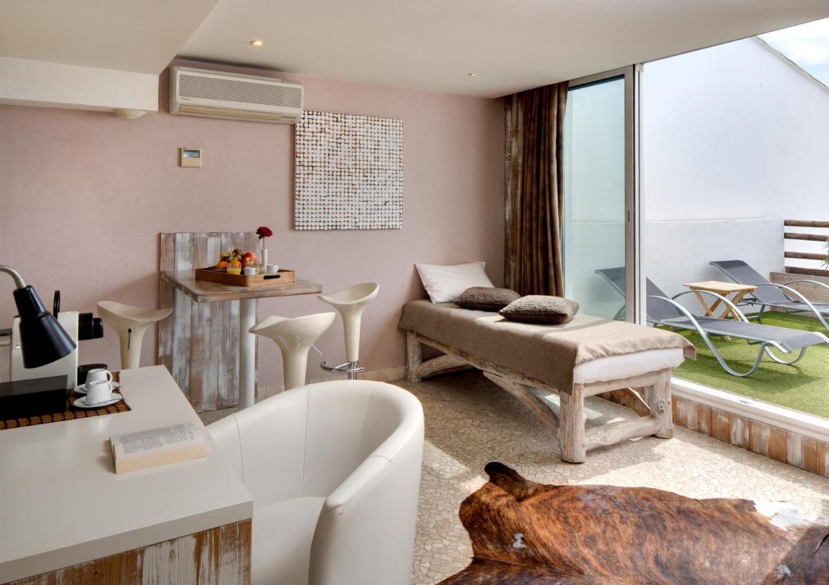 Coin salon dans l'établissement Vila De La Mar & Spa