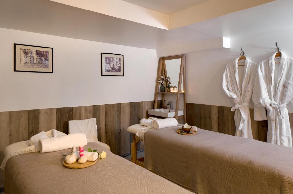 Un ou plusieurs lits dans un hébergement de l'établissement Vila De La Mar & Spa