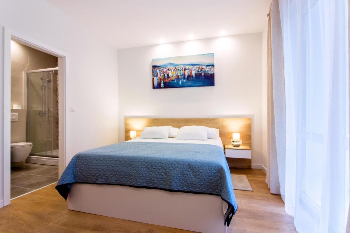 Lugo Apartments - Housity