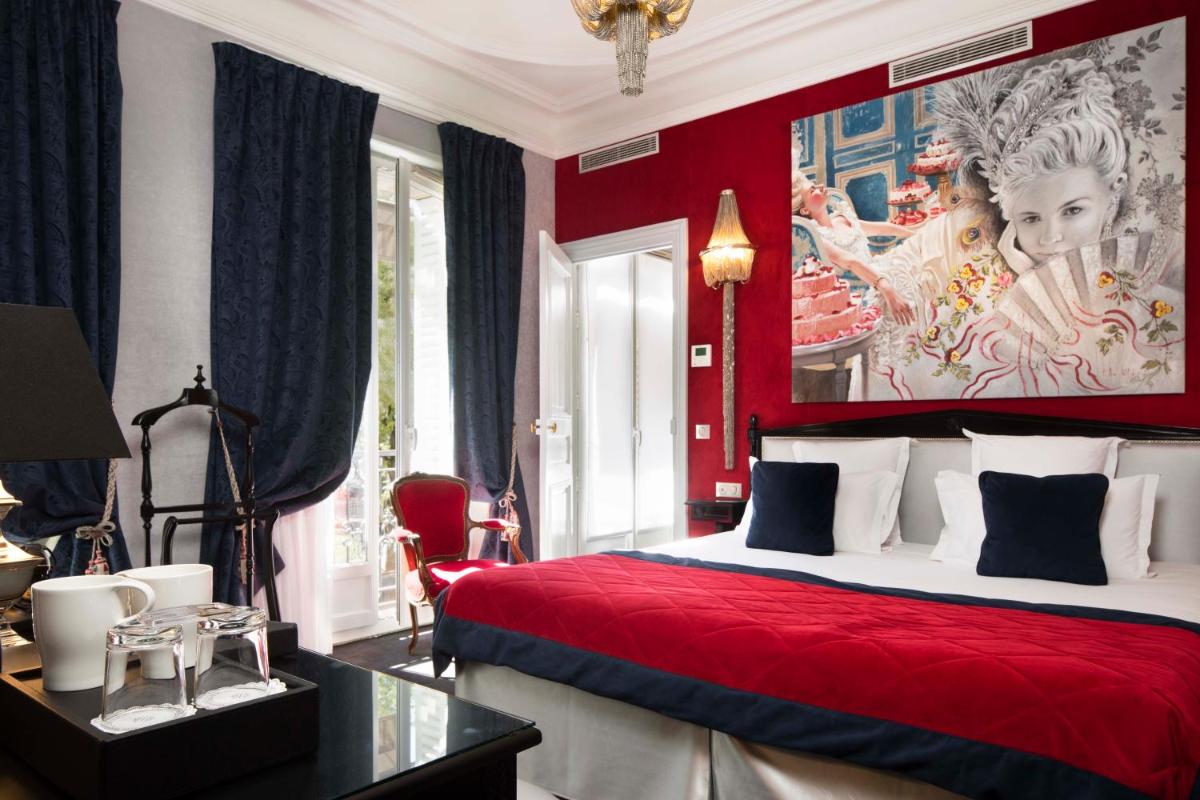 Un ou plusieurs lits dans un hébergement de l'établissement Hotel & Spa de Latour Maubourg