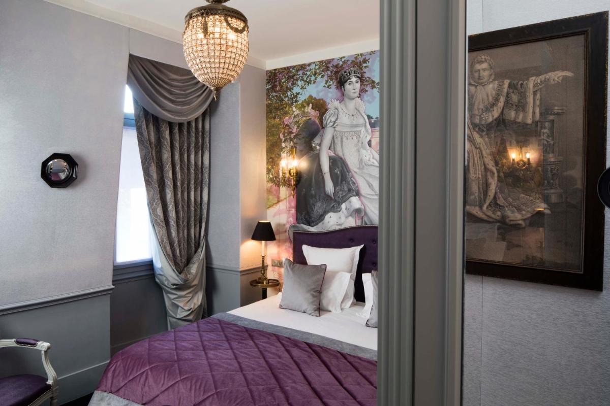 Un ou plusieurs lits dans un hébergement de l'établissement Hotel & Spa de Latour Maubourg