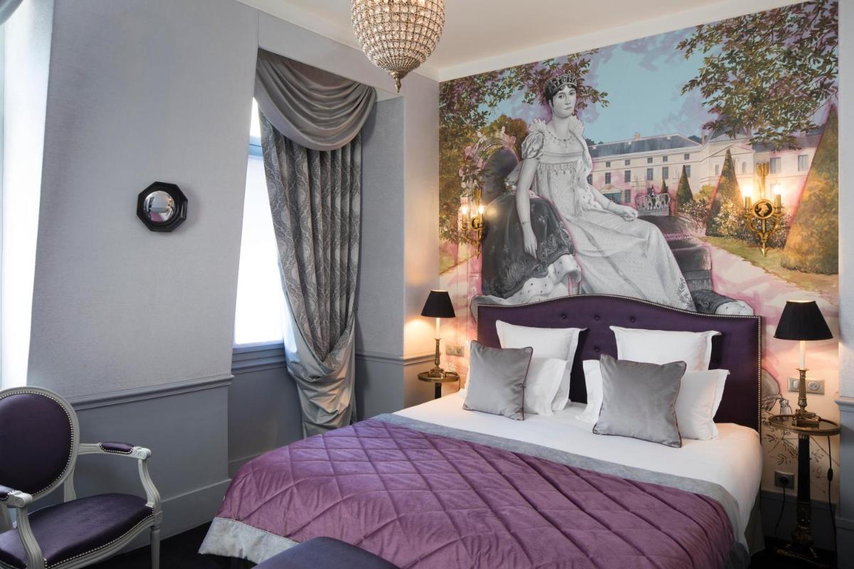 Un ou plusieurs lits dans un hébergement de l'établissement Hotel & Spa de Latour Maubourg