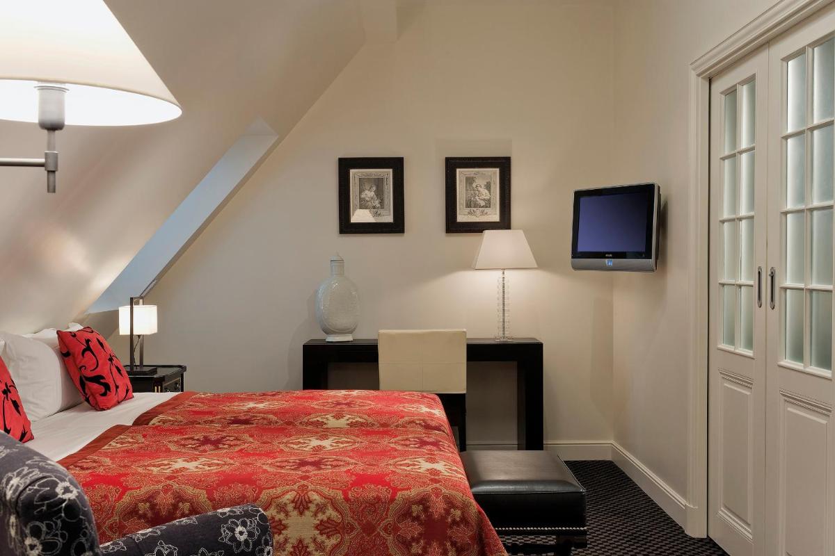 Un ou plusieurs lits dans un hébergement de l'établissement Hôtel Keppler