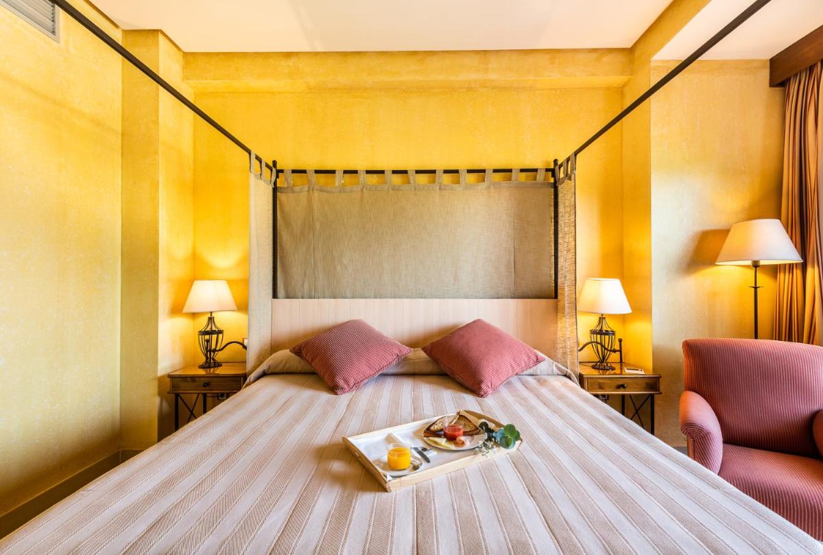Cama o camas de una habitación en Intelier Airén