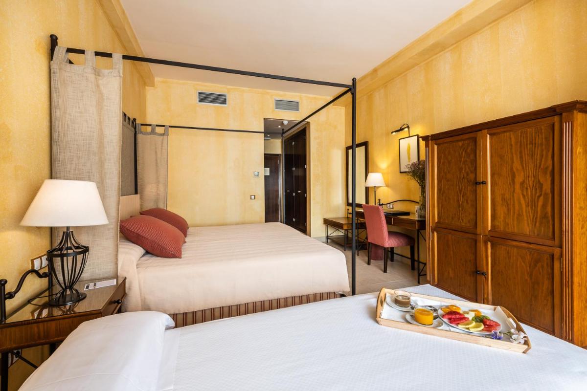 Cama o camas de una habitación en Intelier Airén