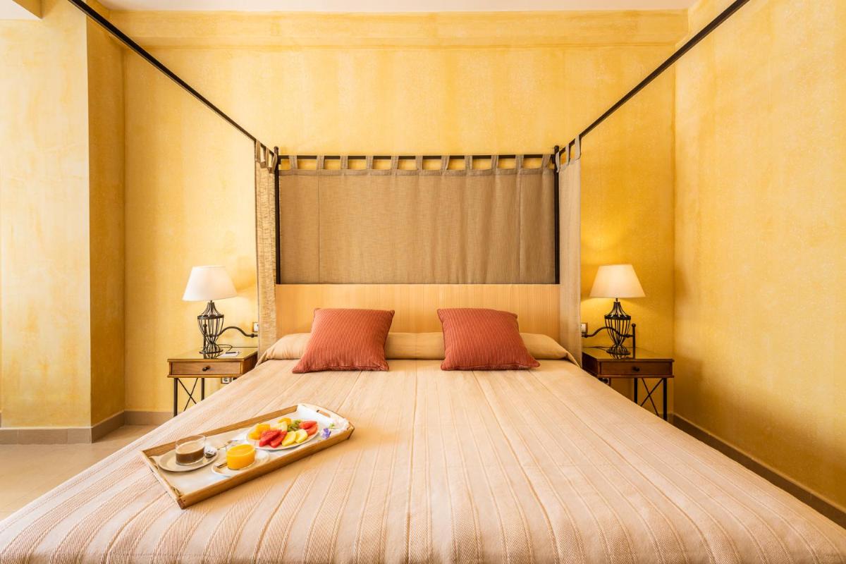 Cama o camas de una habitación en Intelier Airén
