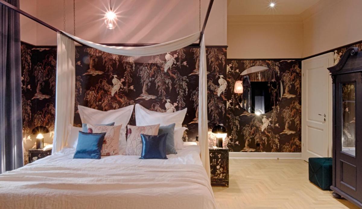 Ein Bett oder Betten in einem Zimmer der Unterkunft Cora Apartments