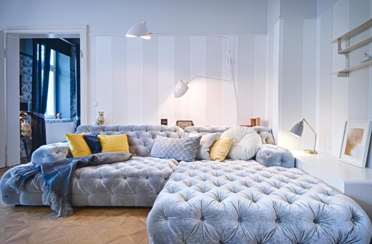 Ein Sitzbereich in der Unterkunft Cora Apartments