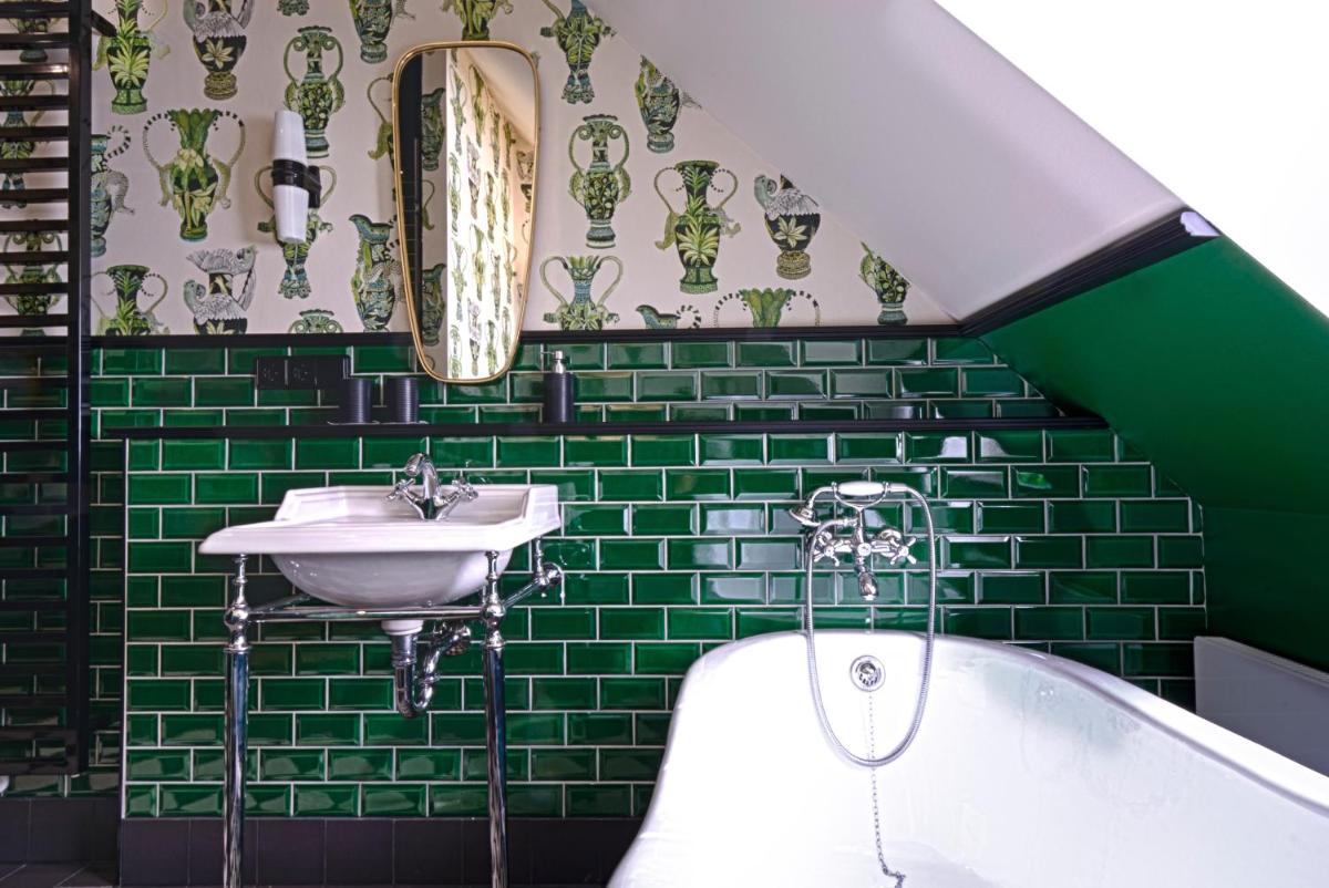 Ein Badezimmer in der Unterkunft Cora Apartments