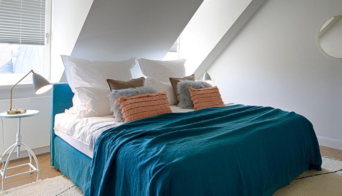 Ein Bett oder Betten in einem Zimmer der Unterkunft Cora Apartments