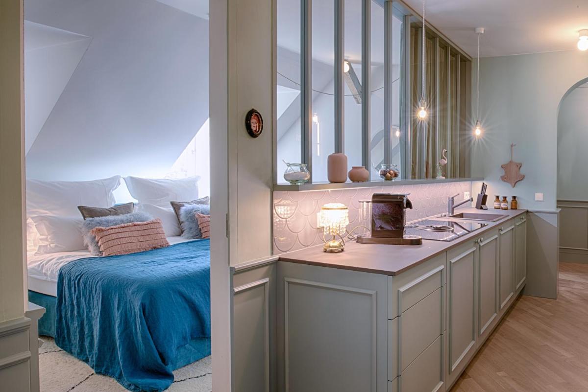 Ein Bett oder Betten in einem Zimmer der Unterkunft Cora Apartments