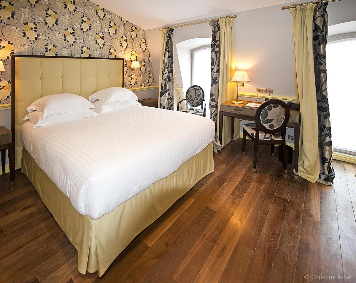 Un ou plusieurs lits dans un hébergement de l'établissement Hôtel de Sèze & Spa Bordeaux Centre