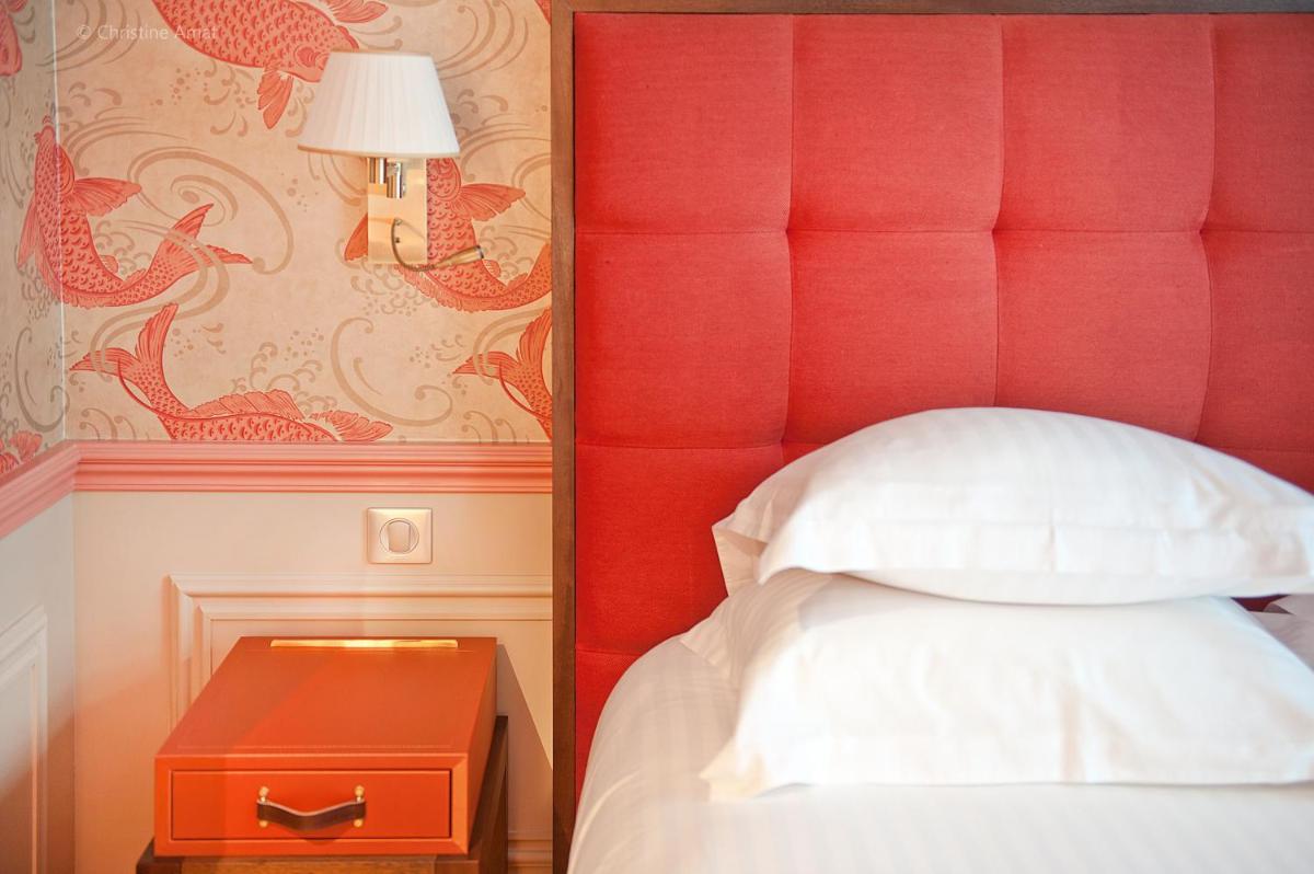 Un ou plusieurs lits dans un hébergement de l'établissement Hôtel de Sèze & Spa Bordeaux Centre