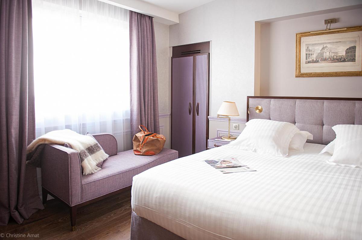 Un ou plusieurs lits dans un hébergement de l'établissement Hôtel de Sèze & Spa Bordeaux Centre