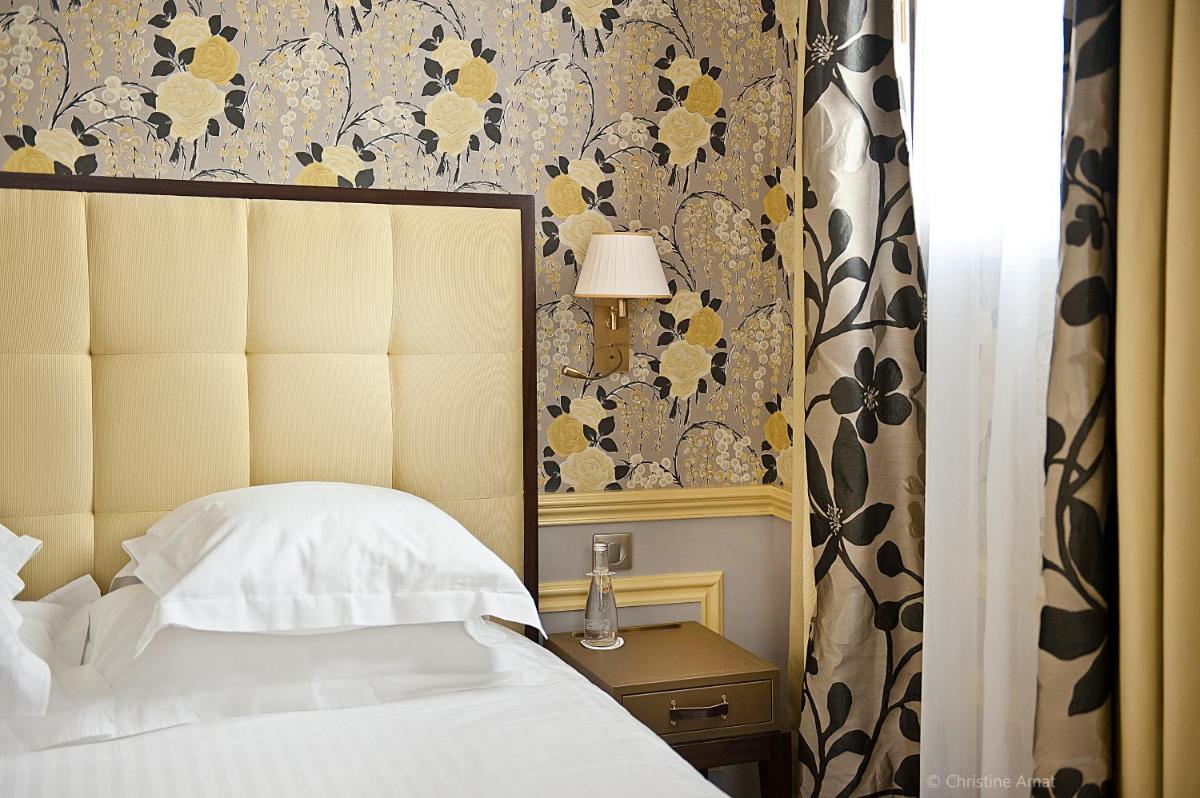 Un ou plusieurs lits dans un hébergement de l'établissement Hôtel de Sèze & Spa Bordeaux Centre