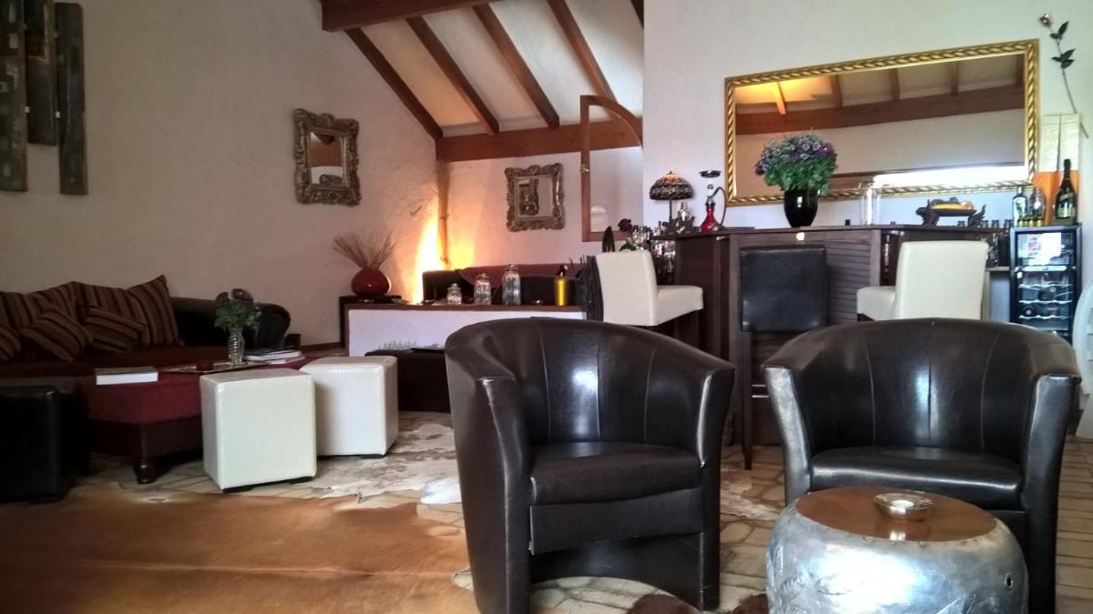 Zona de estar de Birdcage Gay Men Resort and Lifestyle Hotel