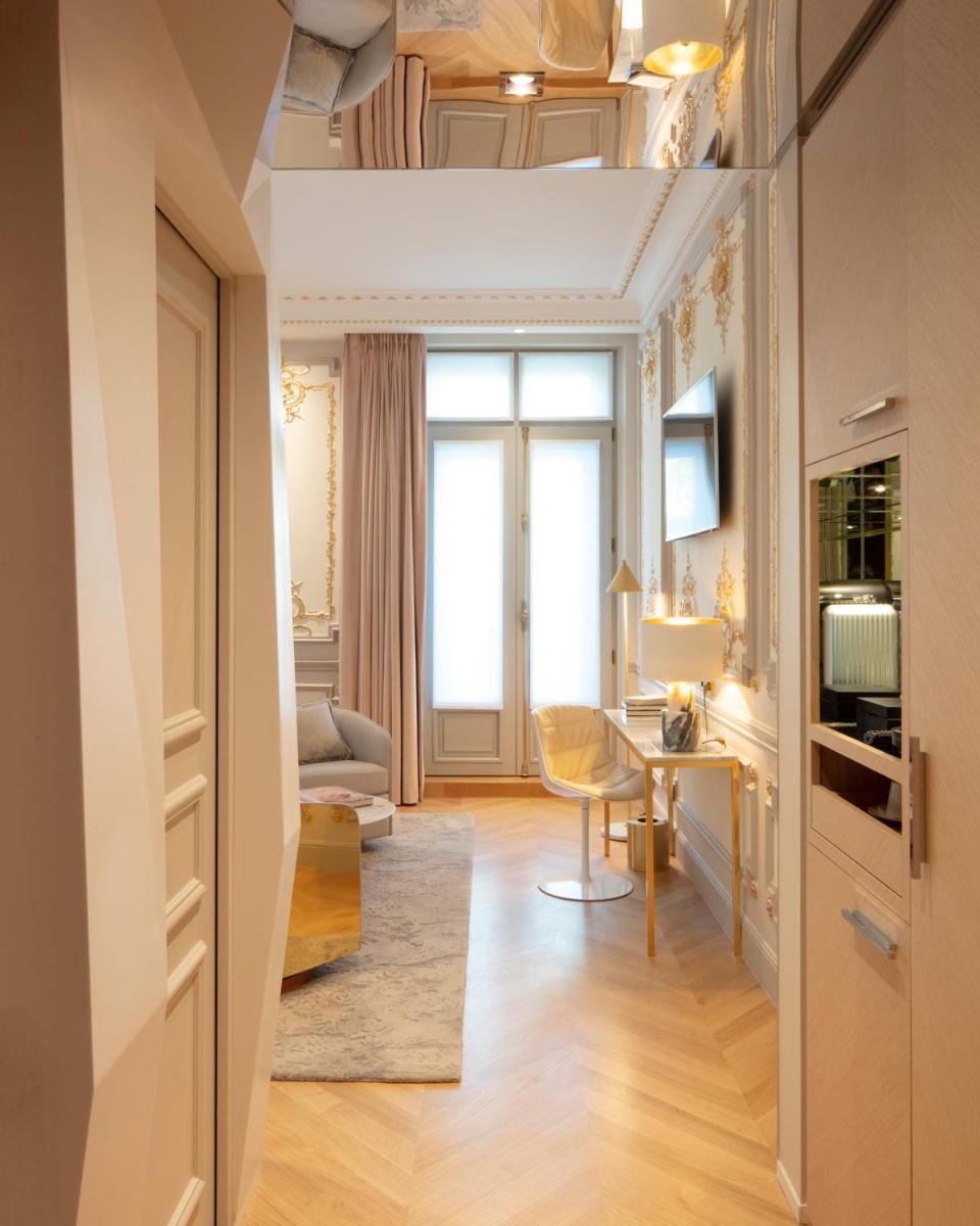 Télévision ou salle de divertissement dans l'établissement Hotel Bowmann