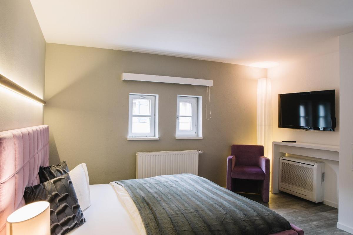 Boutique Hotel Pfauen - Housity