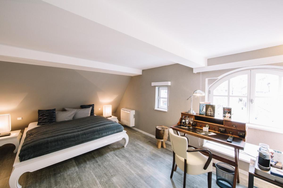 Boutique Hotel Pfauen - Housity