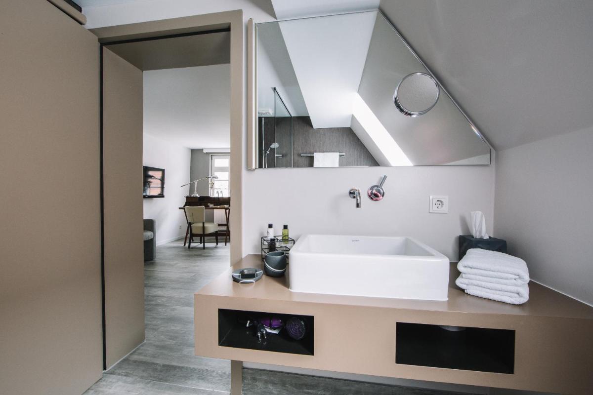 Boutique Hotel Pfauen - Housity