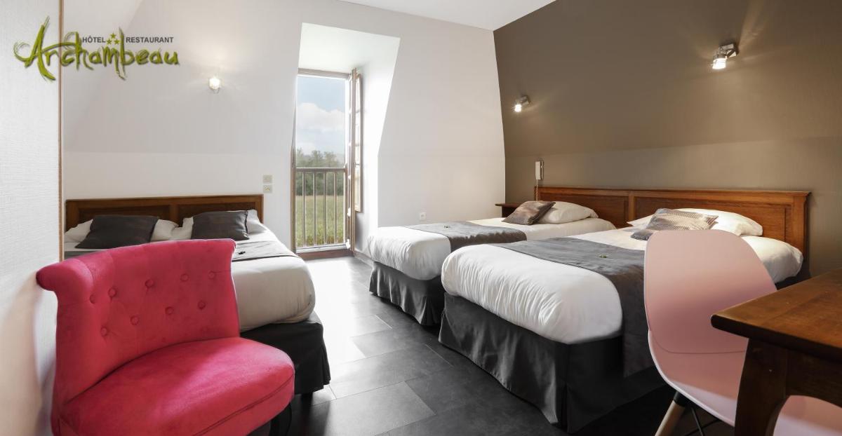 Un ou plusieurs lits dans un hébergement de l'établissement Logis Hotel Archambeau