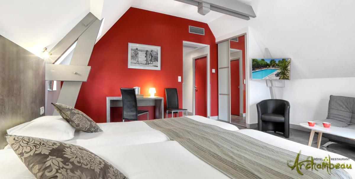 Un ou plusieurs lits dans un hébergement de l'établissement Logis Hotel Archambeau
