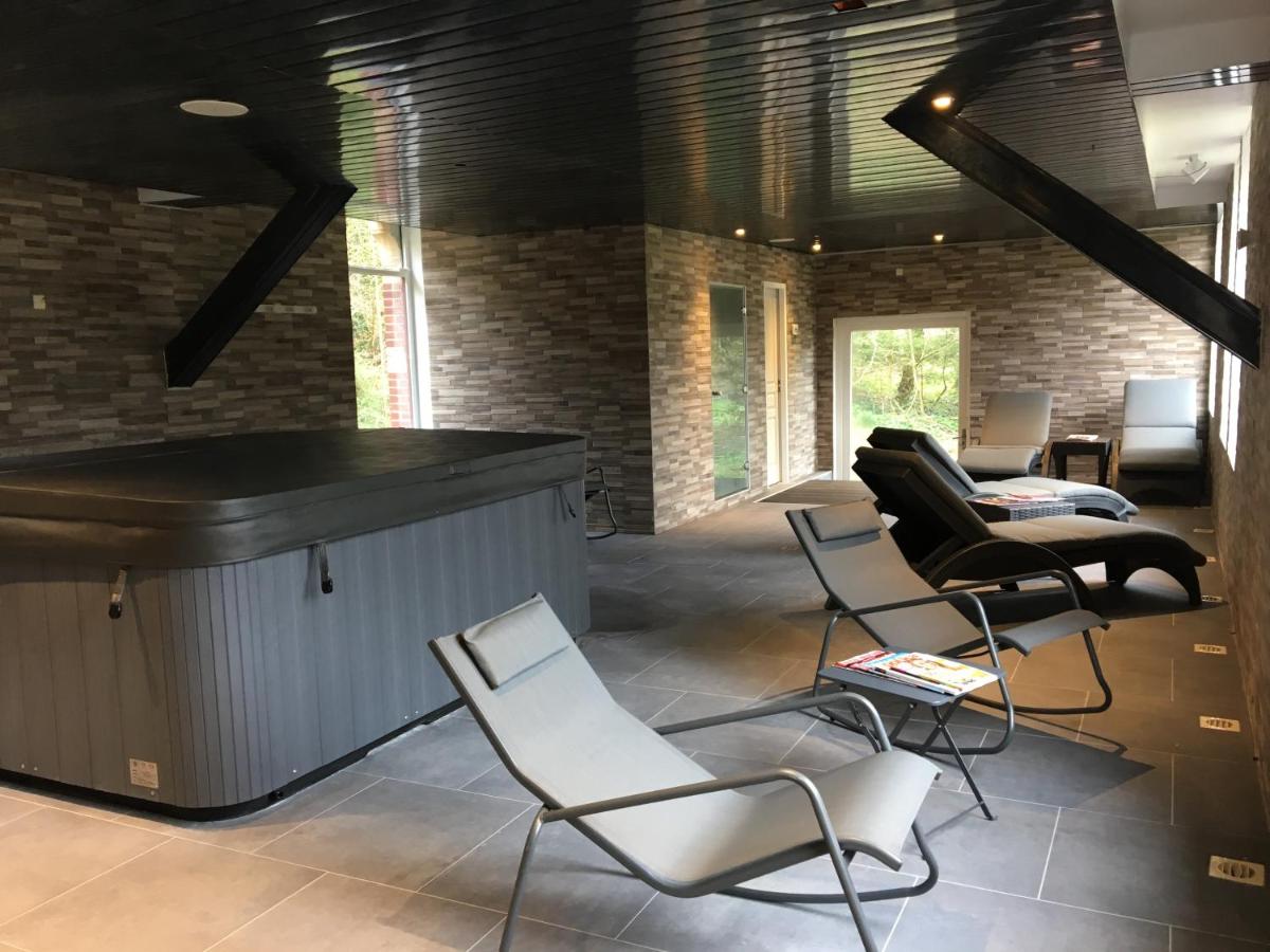 Coin salon dans l'établissement Domaine de Joinville & Spa