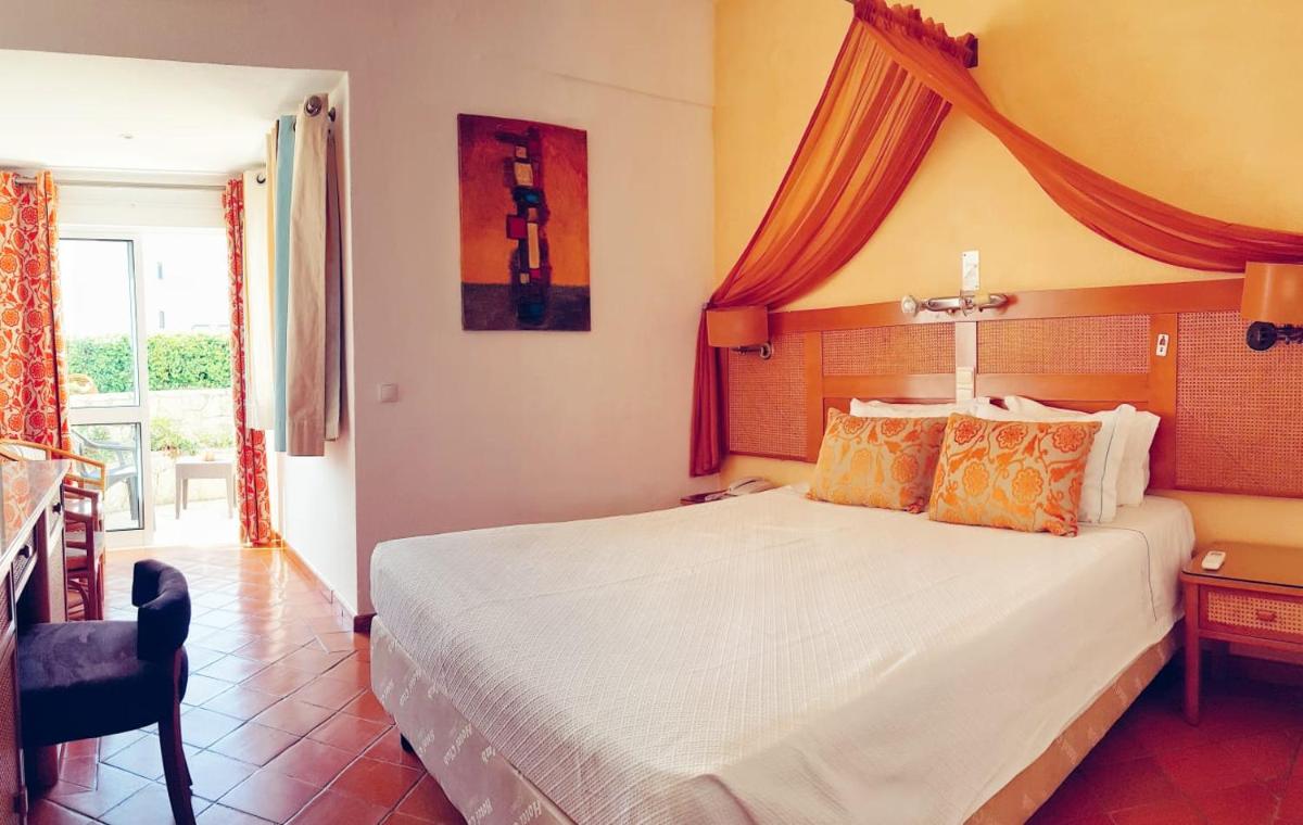 Uma cama ou camas num quarto em Hotel do Cerro