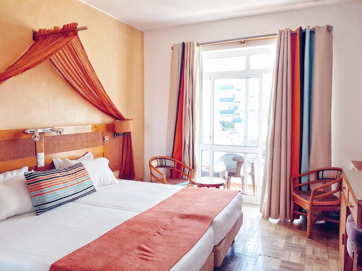 Uma cama ou camas num quarto em Hotel do Cerro