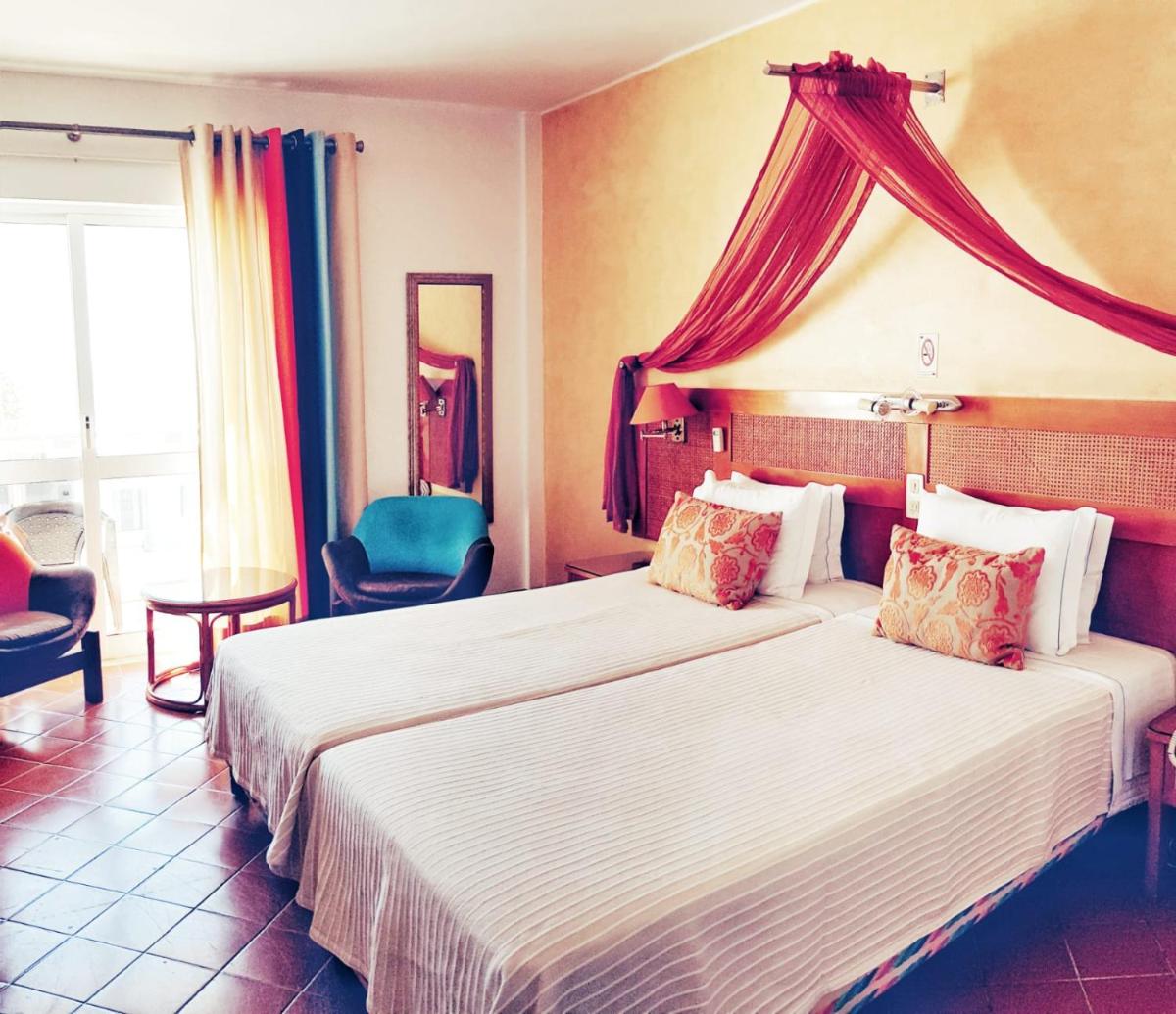 Uma cama ou camas num quarto em Hotel do Cerro
