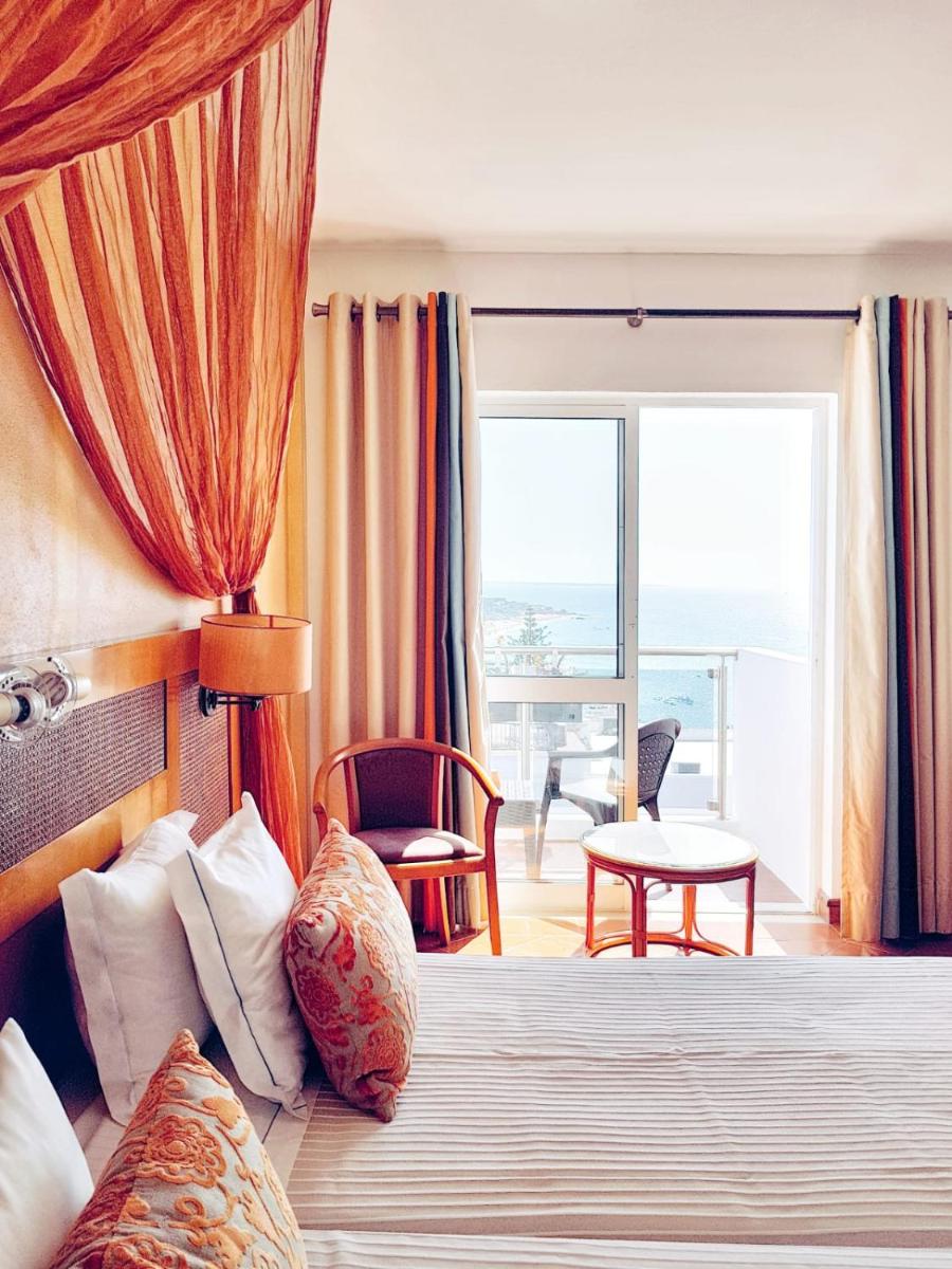 Uma cama ou camas num quarto em Hotel do Cerro