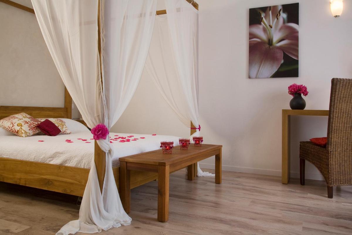 Un ou plusieurs lits dans un hébergement de l'établissement Golfe Hôtel & Spa Porto-Vecchio