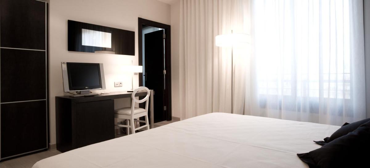 Cama o camas de una habitación en Hotel Bienestar Moaña