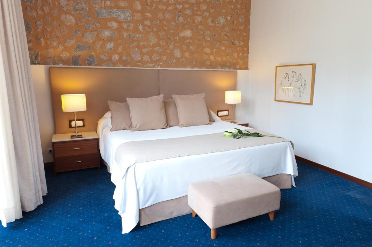 Cama o camas de una habitación en Gran Hotel Soller