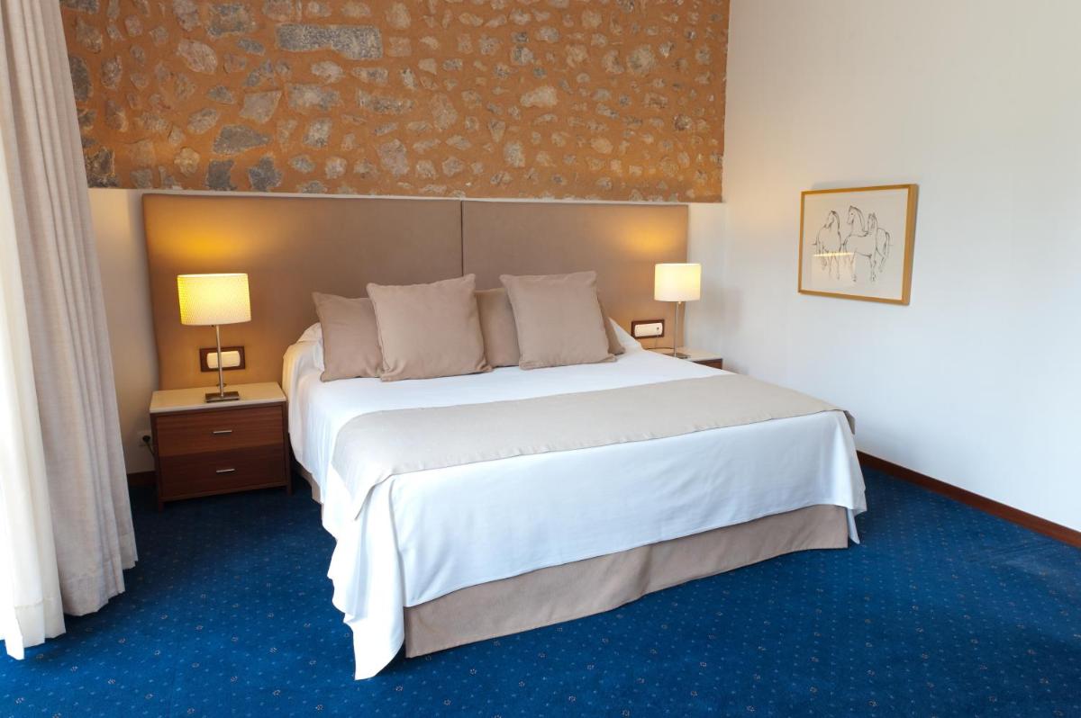 Cama o camas de una habitación en Gran Hotel Soller