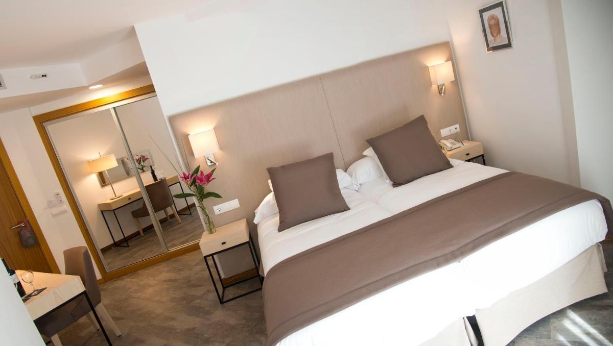 Cama o camas de una habitación en Gran Hotel Soller