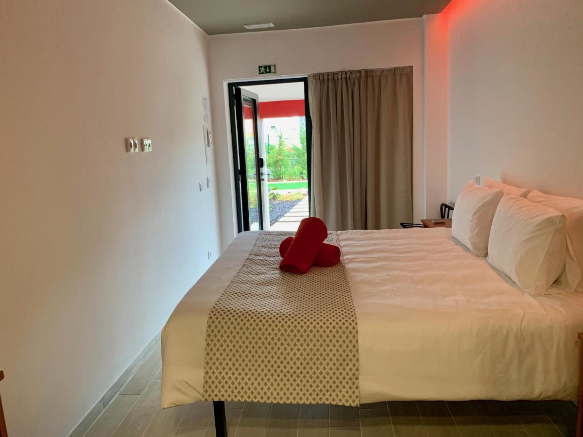 Uma cama ou camas num quarto em Villa 3 Caparica - Lisbon Gay Beach Resort